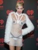 28191-xmiley-cyrus-at-iheartradio-music-festival.jpg.pagespeed.ic.a_lj4un4hp.jpg